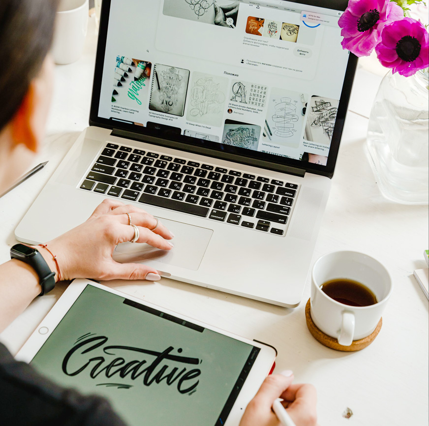 Picture of person creating on the laptop